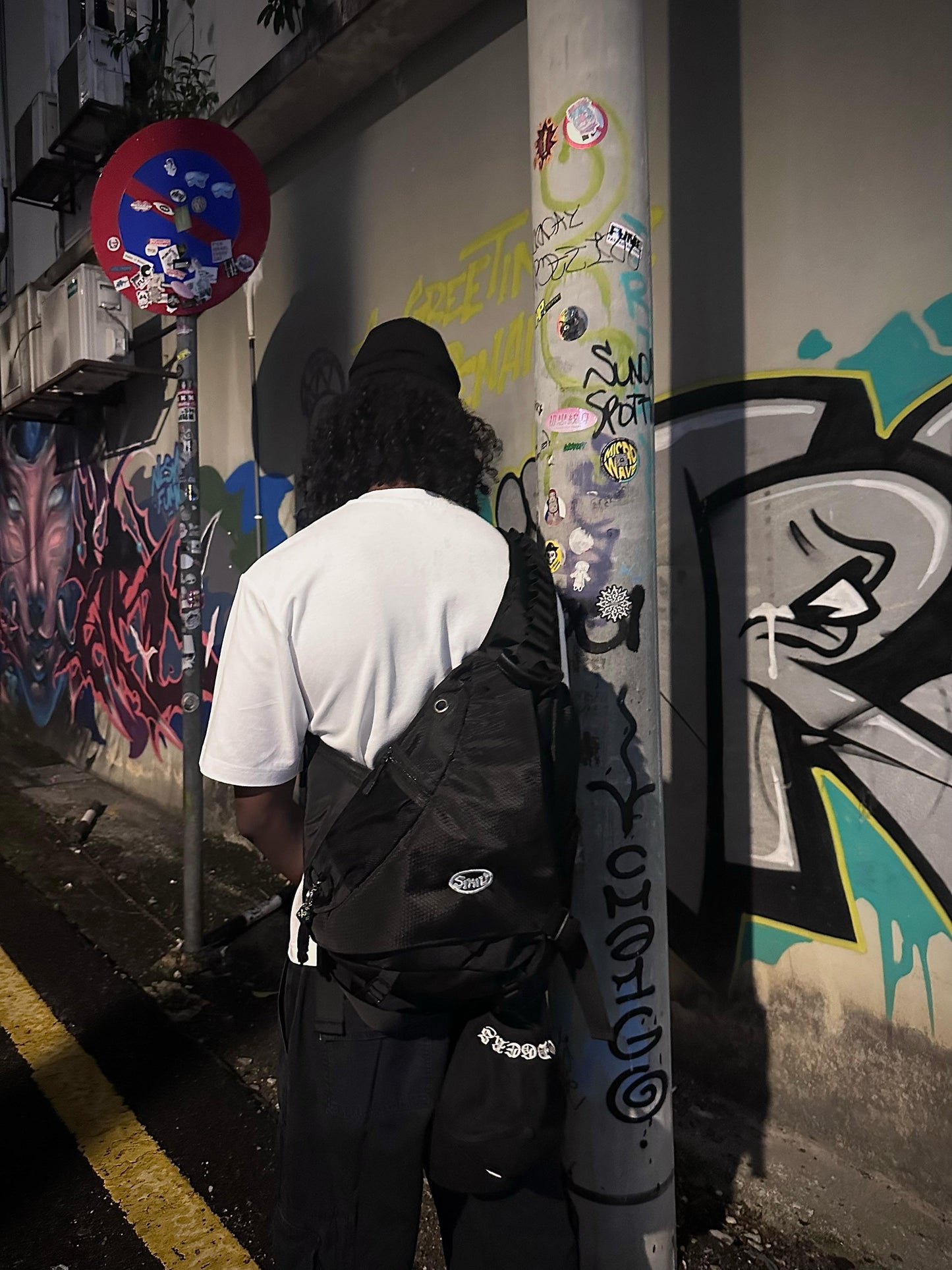 BLACK IN BLACK SLING BAG